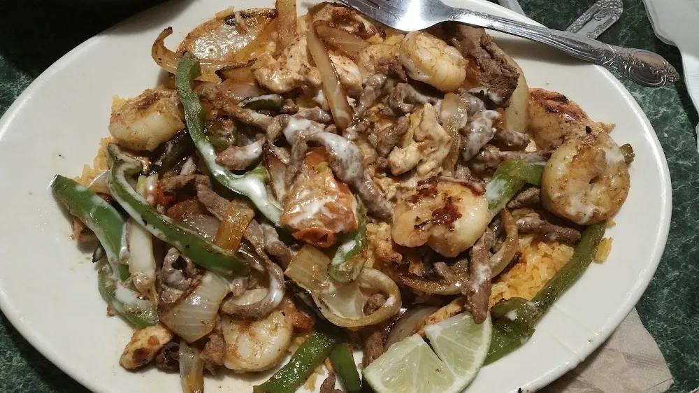 Chicken Steak Shrimp Fajitas over Rice